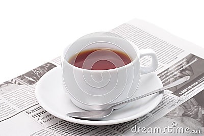 Tea and newspaper Stock Photo