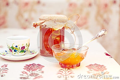 Tea with peach jam retro Stock Photo