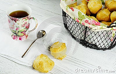 Tea and profiteroles Stock Photo