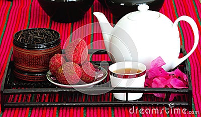 Tea set with chinese tea and litchees Stock Photo