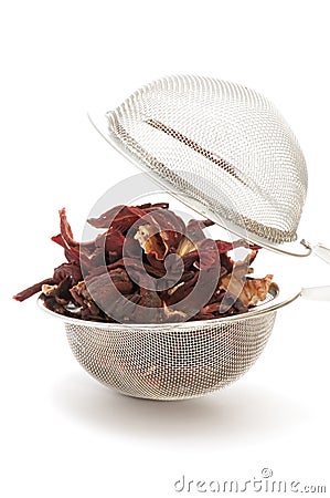 Tea-strainer with tea Stock Photo