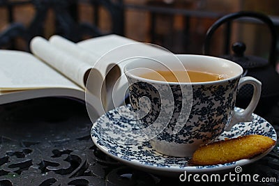 Tea time. relaxing cup of green jazmin tea. world book day background Stock Photo