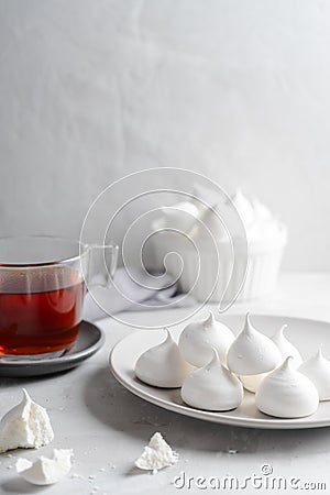 Tea and white homemade meringue Stock Photo