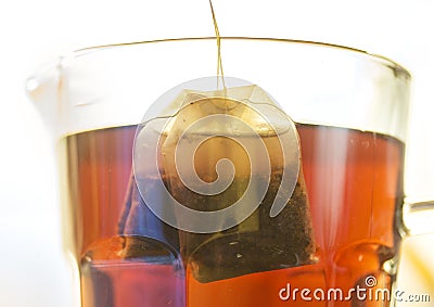 Teabag filter soak in hot water Stock Photo