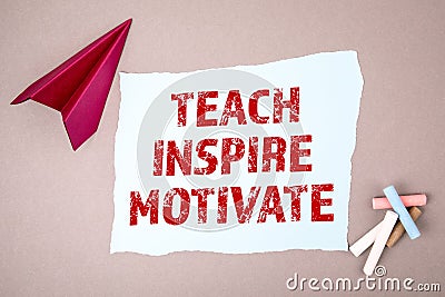 TEACH, INSPIRE and MOTIVATE concept. Text on note sheet, paper plane, symbol of gaining goals Stock Photo