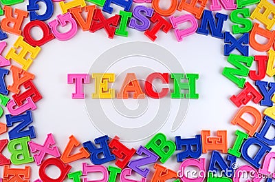 Teach written by plastic colorful letters on a white Stock Photo