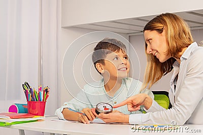 Teacher explain happy boy lesson duration timer Stock Photo