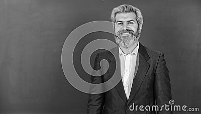 Teacher explain topic. Teachers enlighten path of success. Man teacher in front of chalkboard copy space. Announcement Stock Photo