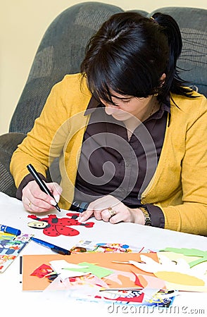 Teacher preparing illustrations Cartoon Illustration