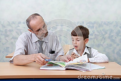 Teacher and schoolboy Stock Photo