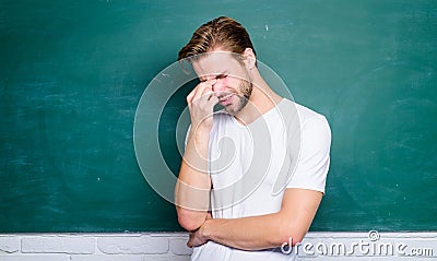 Teacher speaker lecturer. Source of energy and inspiration. Lets begin lesson. Man teacher in front of chalkboard Stock Photo