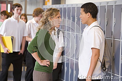 A teacher telling a student off Stock Photo