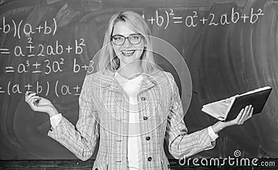 Teacher woman with book chalkboard background. Why teacher quit off sick with stress. Overwork and lack of support Stock Photo