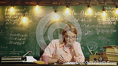 School Student Full X Videos - Teacher Woman Sitting in the Classroom while Reading and Write on the Book.  Student Studying Near Blackboard. Stock Footage - Video of practice,  education: 201297924
