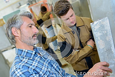 Teaching how to build wall Stock Photo