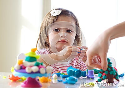 Teaching to use play dough Stock Photo