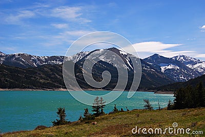 Teal waters of the Gibson Reservoir fed by the Sun river, Montana Stock Photo
