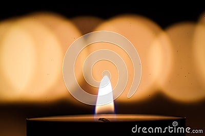 Tealight candles in the dark Stock Photo