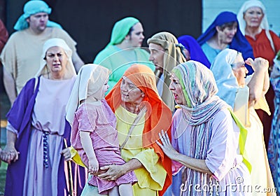 Team actors acting as Jewish women in Passion Jesus Christ play Editorial Stock Photo