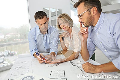 Team of architects meeting and working Stock Photo