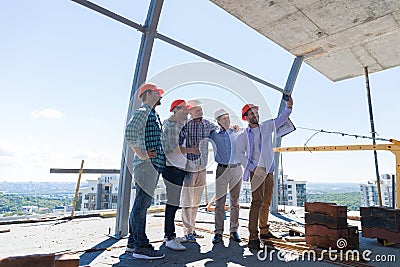 Team Of Builders Happy Smiling Take Selfie Photo During Meeting With Architect And Engineer On Construction Site Stock Photo