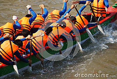 Team building activity, rowing dragon boat racing Editorial Stock Photo