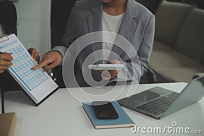 Team of business people working together in the meeting room office, teamwork background charts and graphs banner, double exposure Stock Photo