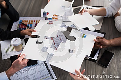 Team of businessmen work together for one goal. Concept of unity and partnership Stock Photo