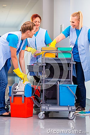 Team of cleaning ladies working Stock Photo