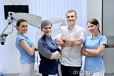 Team of colleagues dentists, portrait of doctors looking at the camera in dental office Stock Photo
