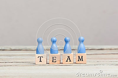 Team concept, blue pawns Stock Photo