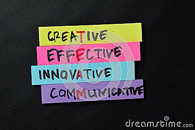 TEAM - Creative Effective Innovative Communicative write on sticky notes isolated on office desk Stock Photo