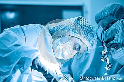 A team of doctors is fighting for the life of the patient. Intensive care unit, fight against viruses and bacretria Stock Photo