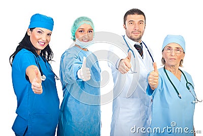 Team of doctors giving thumbs Stock Photo