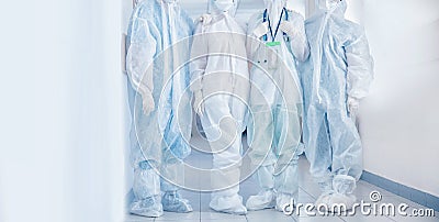 Team doctors and nurses wearing personal protective mask and equipment In hospital clinic. Concept covid epidemic banner Stock Photo