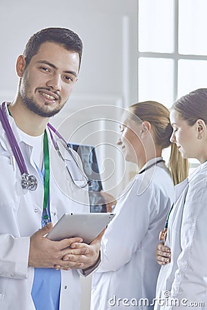 Team of doctors watching x-ray image in a hospital Stock Photo