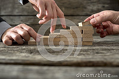 Team effort on the way to success Stock Photo