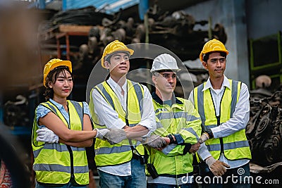 Team engineering, worker standing at warehouse auto parts. industry factory car automobile. Stock Photo