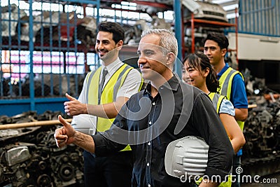 Team engineering worker technician, workshop manufacturing. Stock Photo