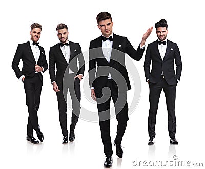 Team of four gentlemen with leader inviting you to wedding Stock Photo