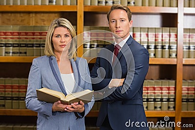 Team of lawyers in the law library Stock Photo