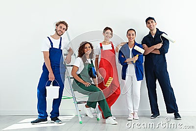 Team of professional painters with tools Stock Photo