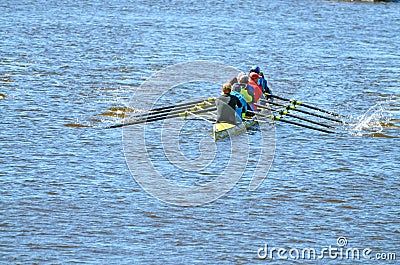 A team of rowers in a sports boat. Editorial Stock Photo