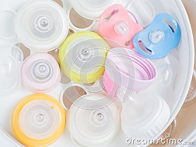 Team sterilizer and dryer sterilize baby accessories. Stock Photo