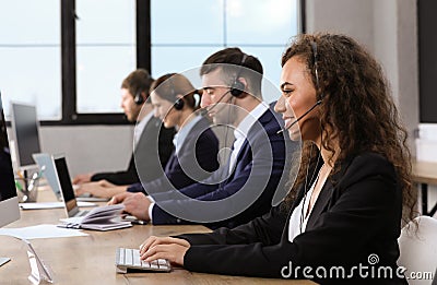 Team of technical support with headsets Stock Photo