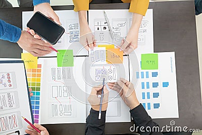 team of UI UX web designer are working together to develop mobile responsive websites with UI UX front end designer previews, UI Stock Photo