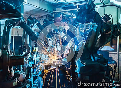 Team welding Robot Stock Photo