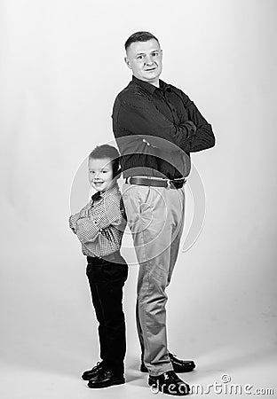 Team work. happy child with father. business partner. childhood. parenting. fathers day. family day. father and son in Stock Photo