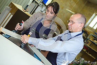 team workers making manual screen printing Stock Photo