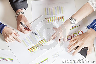 Team of young businesspeople working together with hands Stock Photo